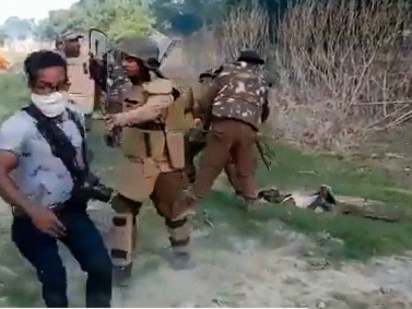 Indian Border Patrol Opens Fire on Unarmed (evicted) Assamese Protester while state Photographer Assaults Corpse